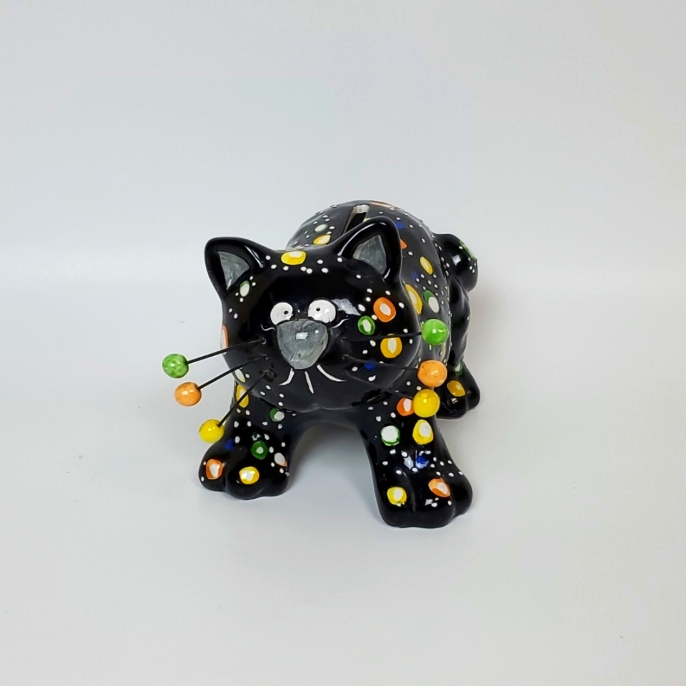 Porcelain cat piggy bank